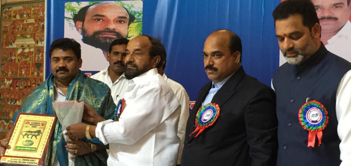 BC Welfare Association leader R Krishnaiah felicitating a BC industrialist at a function held in Hyderabad on Monday